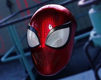 May include: A red and black Spider-Man mask with a mesh eye covering. The mask has a textured surface with small dots.