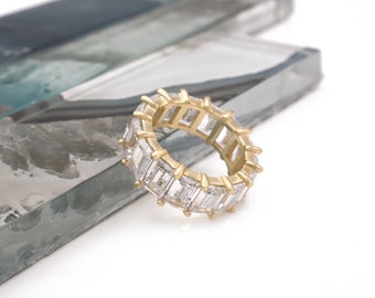 10.00 TCW Created Diamond Emerald Cut Eternity Ring 925 Sterling Silver Yellow Gold Tone 7mm Band