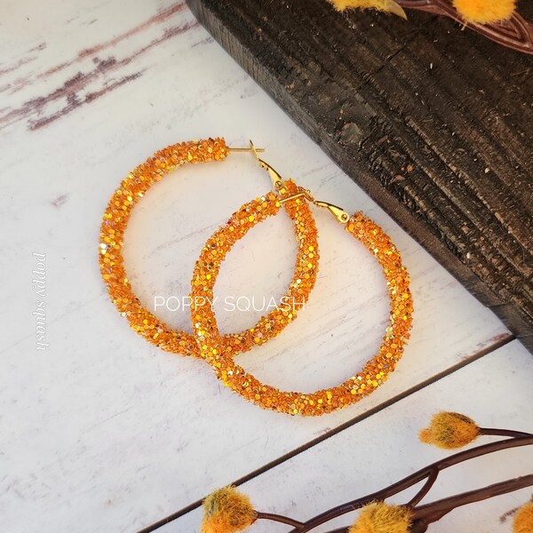 Orange Glitter Hoop Earrings: Gold Tone Stainless Steel ear wires