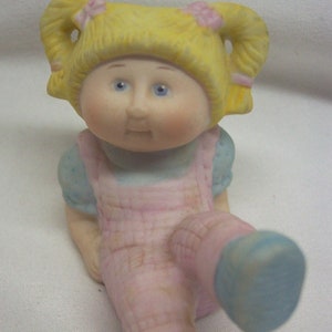 Ceramic cabbage patch doll top