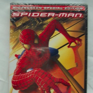 May include: DVD case featuring a red and blue Spider-Man character in a dynamic pose against a yellow and orange background. The text "WIDESCREEN SPECIAL EDITION" and "SPIDER-MAN" are visible on the case.