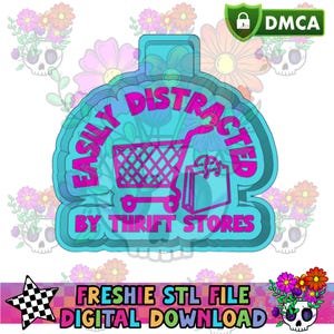 May include: A teal and pink graphic with the text "EASILY DISTRACTED BY THRIFT STORES" and a shopping cart and shopping bag. The image also includes the text "FRESHIE STL FILE DIGITAL DOWNLOAD".