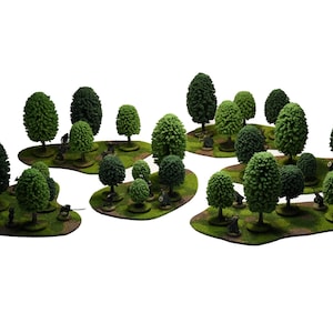 May include: A set of 15 miniature green trees on bases, perfect for tabletop gaming or model railroading.