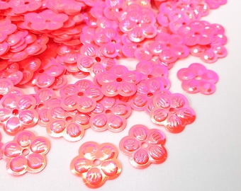 10 g de paillettes de fleurs roses corail avec un éclat vert AB