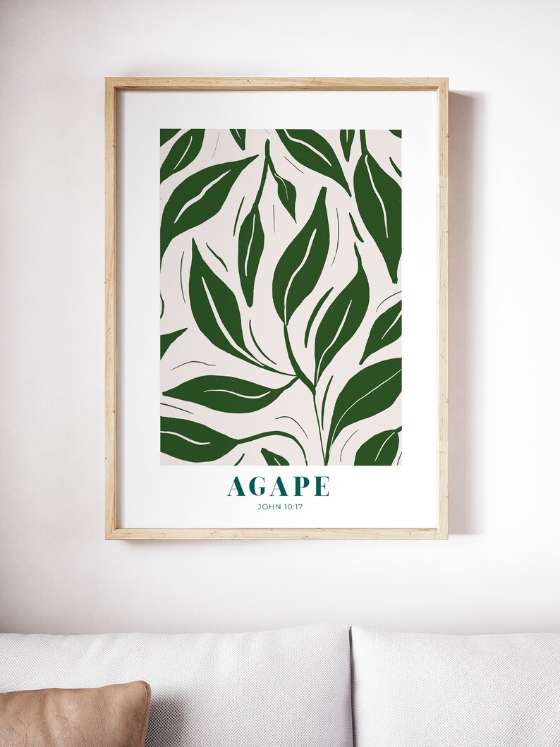 May include: A framed print with a white background and a green leafy pattern. The text "AGAPE JOHN 10:17" is at the bottom of the print.