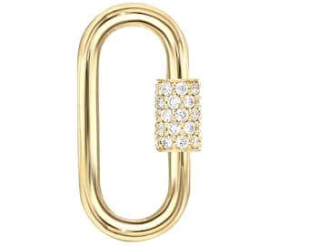 May include: Gold-toned metal clasp with a pave diamond design. The clasp is oval-shaped with a cylindrical diamond-encrusted section.