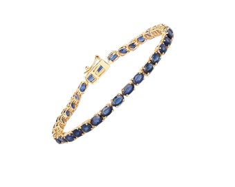 Pulseira de tênis em prata de lei com safira azul de laboratório, pulseira oval com gema.