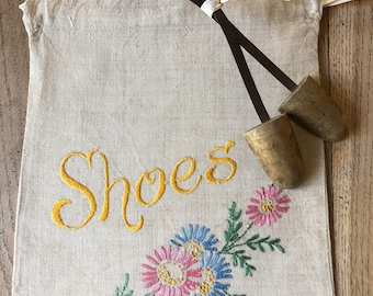 Vintage shoe trees and embroidered bag