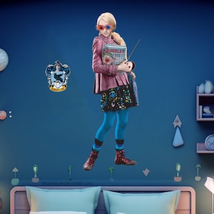 May include: A young woman with blonde hair and blue eyes is wearing a pink jacket, a colourful skirt, and blue tights. She is holding a wand and a magazine called "The Quibbler". The background is a blue wall with a Ravenclaw house crest.