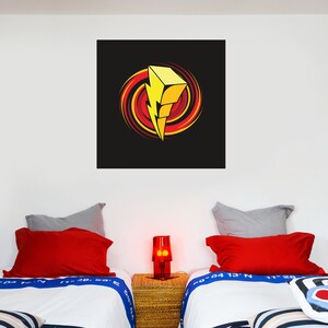 May include: A black square with a yellow lightning bolt in a red and orange swirl. The lightning bolt is stylized and has a 3D effect.