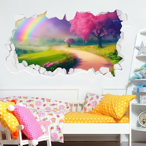 May include: A 3D wall decal featuring a whimsical scene with a rainbow, a winding path, and a pink flowering tree. The decal creates the illusion of a hole in the wall, revealing a magical landscape.
