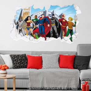 May include: A wall decal featuring the Justice League characters Superman, Batman, Wonder Woman, Aquaman, The Flash, and Green Lantern. The characters are standing in front of the Hall of Justice building.