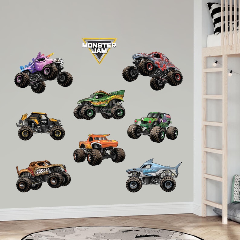 May include: A set of eight Monster Jam monster truck wall decals. The decals feature different monster trucks with various colors and designs, including a purple unicorn truck, a green and black truck, a red and black truck, a blue and white shark truck, and an orange truck. The decals are perfect for adding a fun and exciting touch to any child's room.