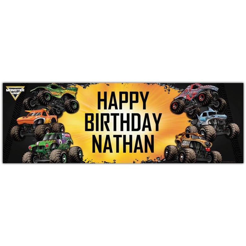 May include: A banner featuring several monster trucks in various colors, including green, orange, red, and blue. The banner has the text "HAPPY BIRTHDAY NATHAN" in large, bold letters against a yellow and black background. The Monster Jam logo is in the upper left corner.