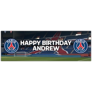 May include: A banner with a blue and white Paris Saint-Germain soccer team logo on each side. The banner has a green field, red and blue seats, and the text "Happy Birthday Andrew".