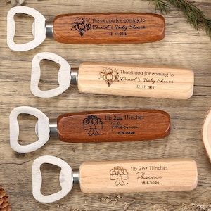 May include: Wooden bottle openers with silver metal opener heads. Two openers are engraved with "Thank you for coming to Daniel's Baby Shower" and the date. The other two say "1lb 2oz 11inches Phoenix" and the date.