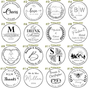 May include: A set of 16 round wooden stamps with various wedding designs. Each stamp features a different design, including names, dates, and illustrations. The stamps are black and white and have a rustic, vintage look.
