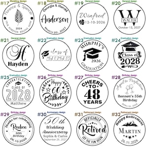 May include: A set of 32 round rubber stamps with various designs, including wedding, graduation, birthday, and retirement themes. Each stamp features a unique design and text, such as "Florence & Spencer", "Class of 2026", "Happy 60th Birthday", and "Officially Retired".