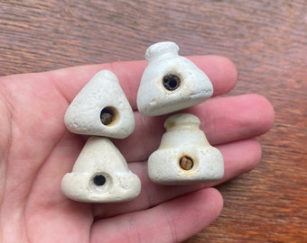 Four vintage ceramic stoppers found on my local north east England coastline beach