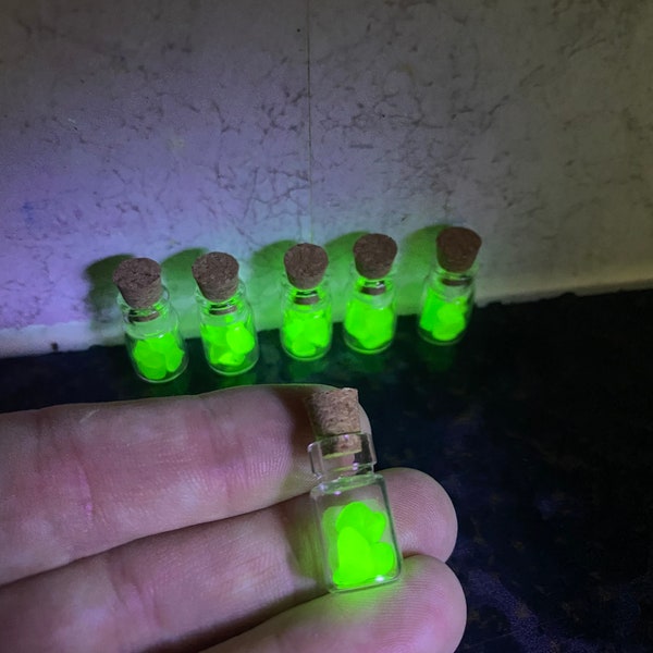 Individual  miniature bottles with seaham Seaglass uv Seaglass inside . Uranium glass 10 available