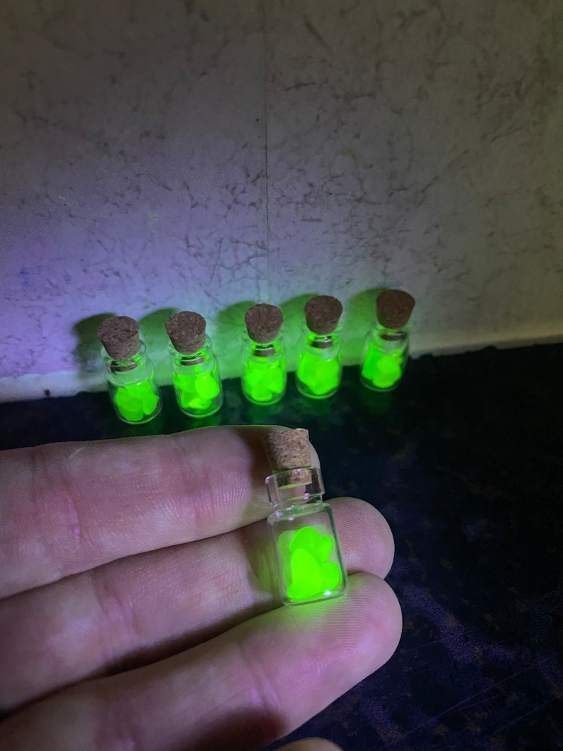 Individual miniature bottles with seaham Seaglass uv Seaglass inside . Uranium glass 10 available image 1