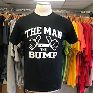 The Man Behind the Bump Men T shirt