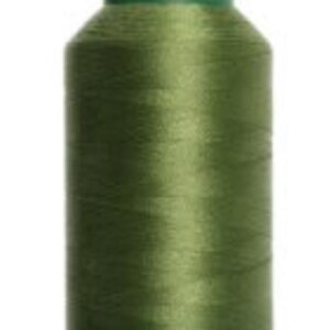May include: A spool of olive green thread. The thread is tightly wound around a cylindrical core with a green base and top. The thread has a slight sheen, suggesting a smooth texture, and is suitable for sewing and embroidery projects.