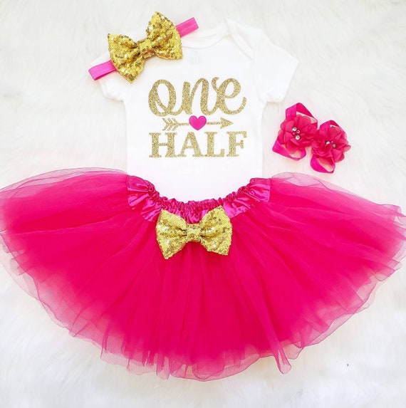 hot pink and gold outfit