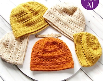 May include: Five crocheted beanies in mustard yellow, cream, and burnt orange colors. Each hat features a textured pattern with horizontal rows of stitches and small gaps. A small wooden tag with the text canoemtndesigns is placed in the center.