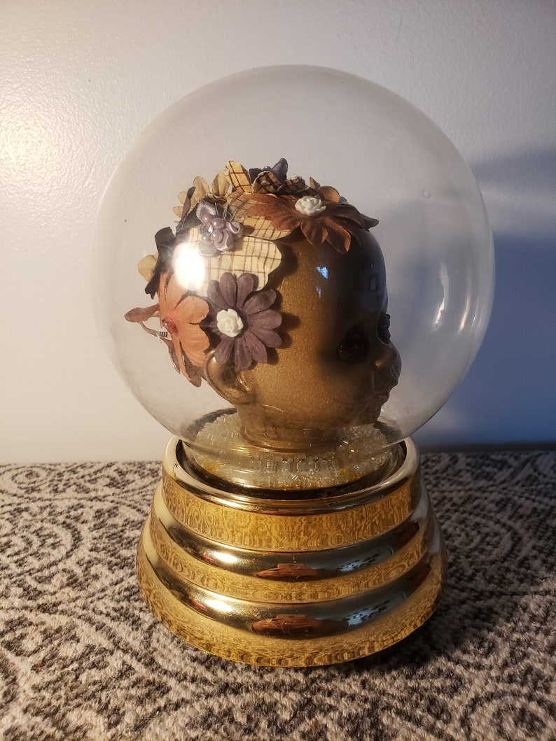 Trapped Musical Spinning Sculpture Globe