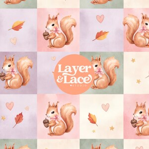 May include: A repeating pattern fabric design featuring watercolor illustrations of squirrels with pink bows holding acorns, interspersed with orange autumn leaves, small pink hearts, and yellow stars on a grid of pastel pink, green, and cream squares.