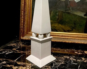 Obelisk On Four Balls