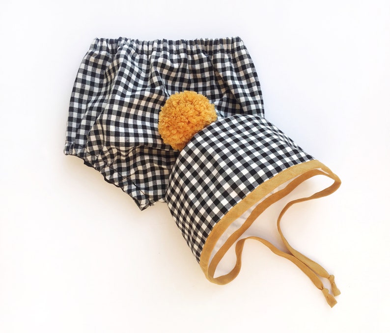 Autumn Winter Bonnets Black and White Gingham Bonnet with Mustard Binding and matching Pom Pom Baby and Toddler Bonnets Handmade Bonnets