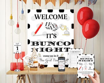 May include: A 7-piece printable Bunco party invitation set with a black and white polka dot design. The set includes a welcome sign, table number cards, a scorecard, a dice roll card, and a Bunco night invitation card. The text on the welcome sign reads "Welcome, It's Bunco Night, Come on in & The Good Times Roll".
