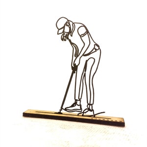 Golf-Spielerin! Ja auch die Frauen beherrschen es gut
