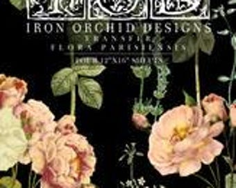 May include: Book cover with the title "Iron Orchid Designs" and the subtitle "Transferware Flora & Gardens". The cover features a black background with a floral design in shades of pink, white, and green.