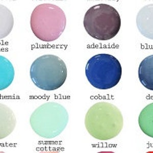May include: A chart of 18 paint color swatches with names below each swatch. The colors include cherry pie, purple posies, plumberry, adelaide, bluebird, harbor, capri, bleu bohemia, moody blue, cobalt, denim, providence, navy blues, sweetwater, summer cottage, willow, julep, and pantry door.