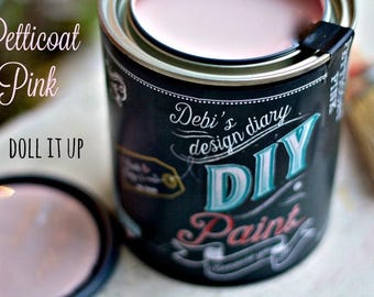 May include: A can of pink paint labeled "Petticoat Pink" with the text "Debi's design diary DIY Paint" on the side.