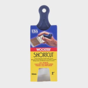 May include: A Wooster Shortcut paint brush, 2 inches wide, with a blue handle and a yellow and red label. The label includes the text "Shortcut" and "Made in USA". The brush is designed for all paints.