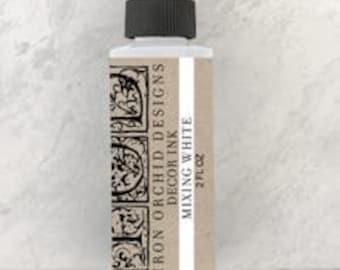 May include: A clear plastic bottle with a black dropper top, containing white mixing ink. The label reads "Iron Orchid Designs Mixing Ink, White, 2 fl oz."
