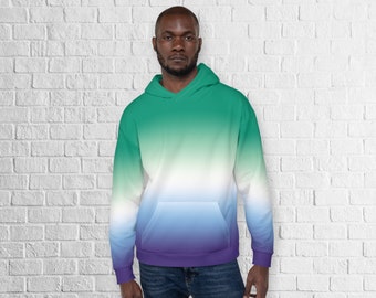 May include: A green, white, blue, and purple ombre hoodie. The hoodie has a drawstring hood and a kangaroo pocket.