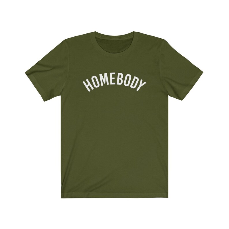 May include: A green short-sleeved t-shirt with the word "HOMEBODY" printed in white on the front.