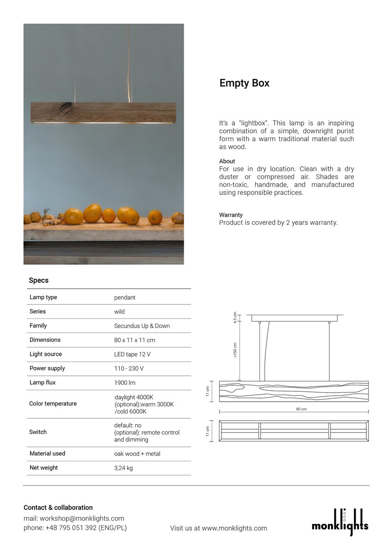 May include: A wooden pendant light fixture called "Empty Box" by Monklights. The light is made of a simple, rectangular wooden frame with a warm, natural wood finish. The light is suspended from the ceiling by three wires. The light is 80 cm wide, 11 cm high, and 11 cm deep. The light is available in a variety of colors and finishes.