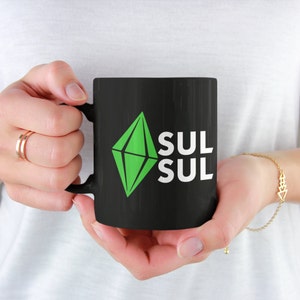 The Sims Greetings Sul-Sul Green Plumbob Black Ceramic Mug 11oz