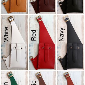 May include: Nine leather phone holsters in different colors: beige, brown, black, white, red, navy, green, rustic, and tan. Each holster has a strap and a pocket with a flap.