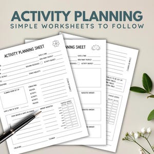 May include: Three white activity planning sheets with black text and a black pen. The top sheet reads "ACTIVITY PLANNING SHEET" and includes sections for event details, budget, and a flow of events.