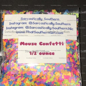 May include: A clear plastic bag filled with colorful mouse-shaped confetti. The bag has a white label that reads "Sarcastically Southern" and "Mouse Confetti 1/2 ounce".