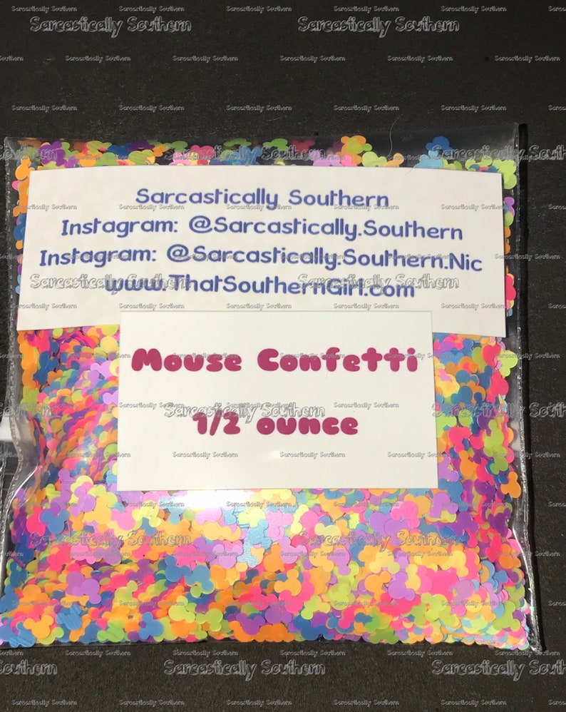 May include: A clear plastic bag filled with colorful mouse-shaped confetti. The bag has a white label that reads "Sarcastically Southern" and "Mouse Confetti 1/2 ounce".