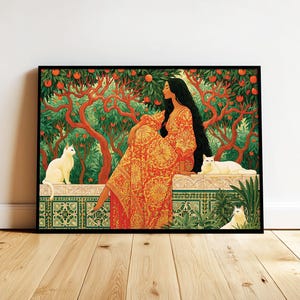 May include: A framed art print depicting a person with long dark hair wearing a patterned orange dress, sitting on a tiled wall. Three white cats are positioned around the person, surrounded by an orange orchard with green leaves and orange fruit.