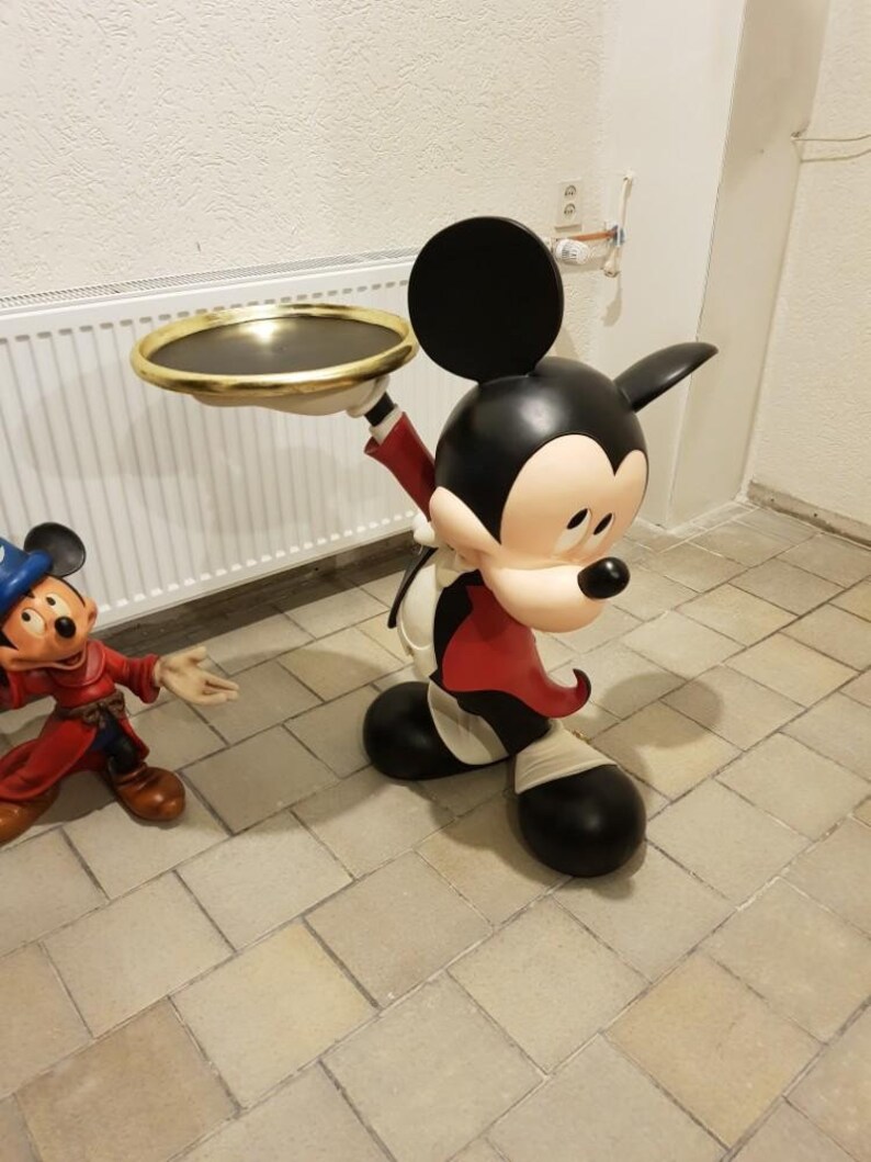 large wooden mickey mouse statue